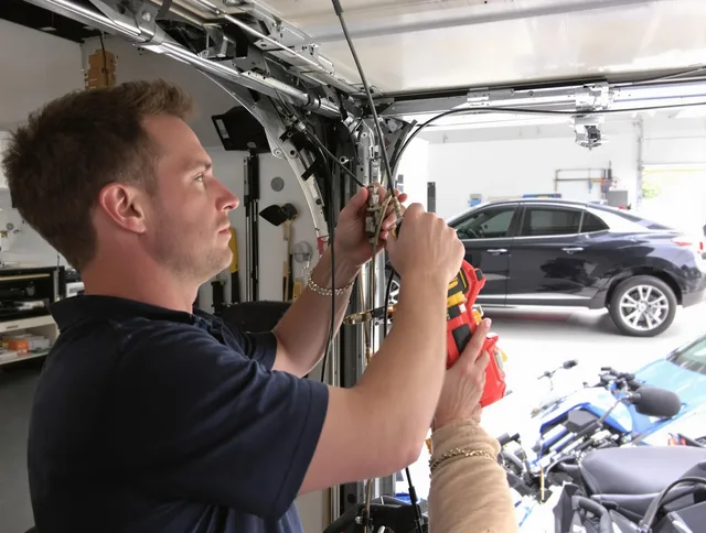Chino Hills Garage Door Repair safety certified technician performing cable replacement in Chino Hills
