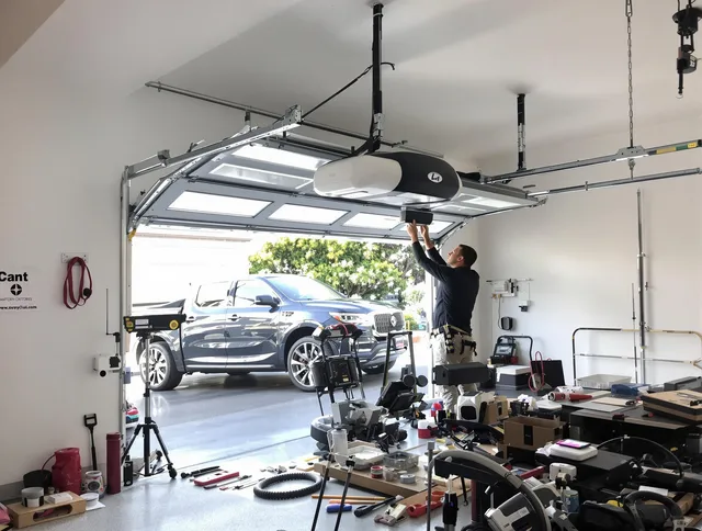 Chino Hills Garage Door Repair specialist installing smart garage door opener system in Chino Hills home